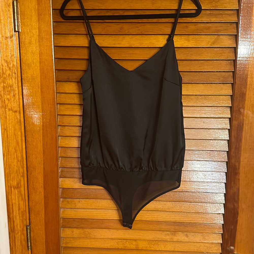 Never worn black bodysuit from local boutique in Montreal